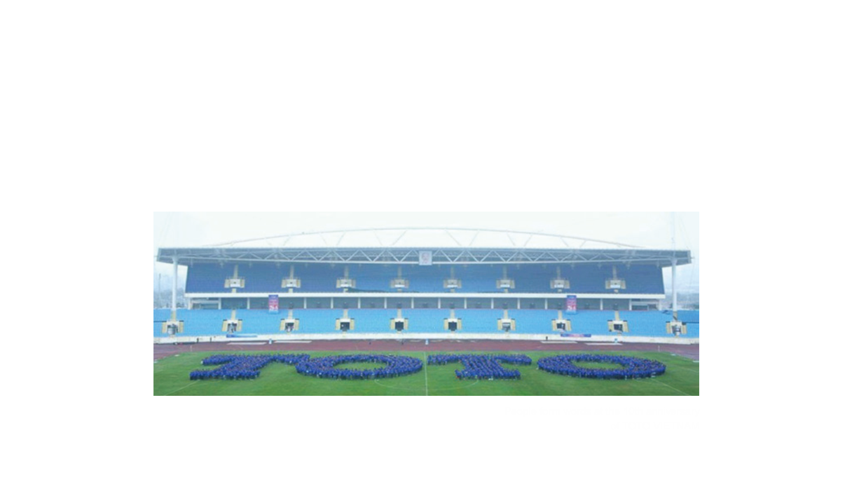 People form words at the 10th anniversary of TOTO VIETNAM